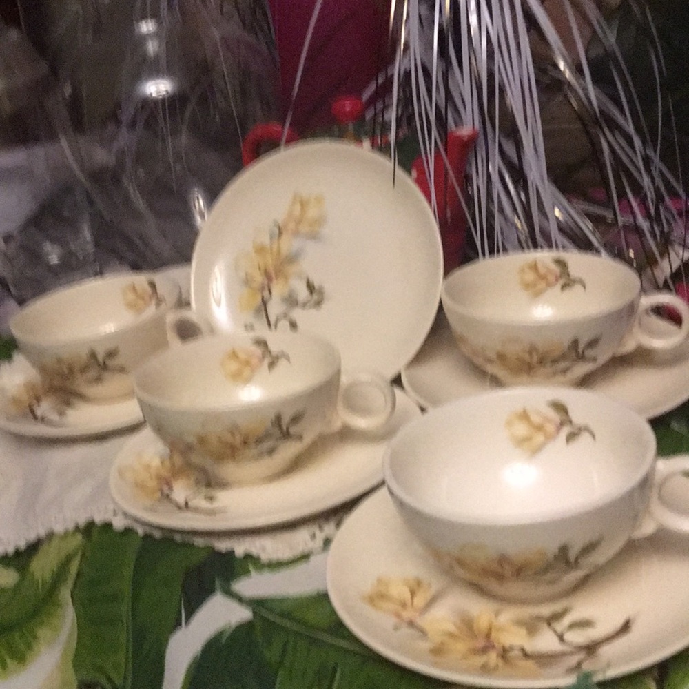 Delicate cup and saucer yellow/green